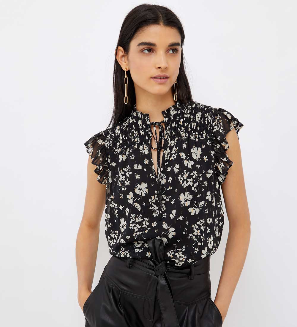 Blusa nera a fiori