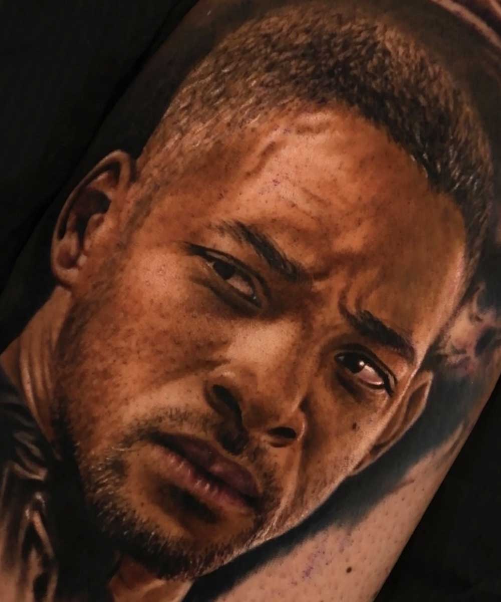 Tatuaggi braccio colorati realistici personaggi