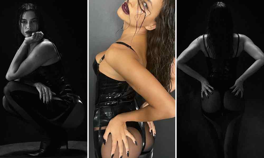 Sexy Irina Shayk in latex nero e lato B nudo