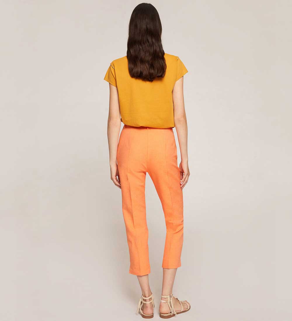 Motivi pantaloni arancioni