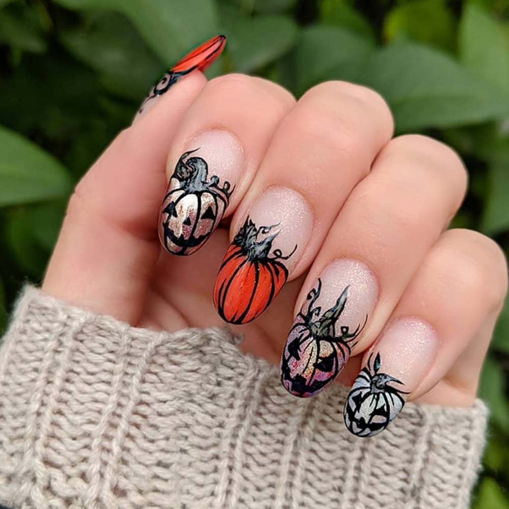 Halloween gel nail art con zucche disegnate