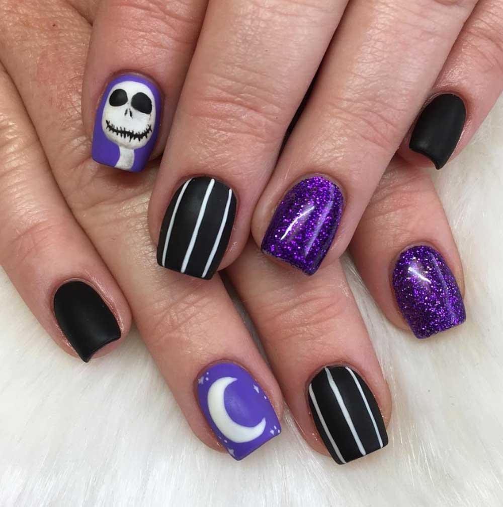 Halloween nail art viola e nero