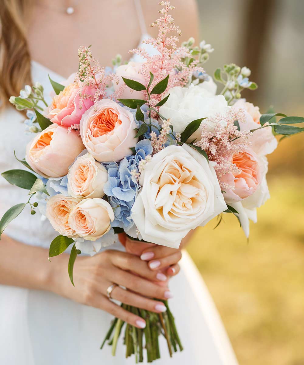 Bouquet sposa peonie e rose