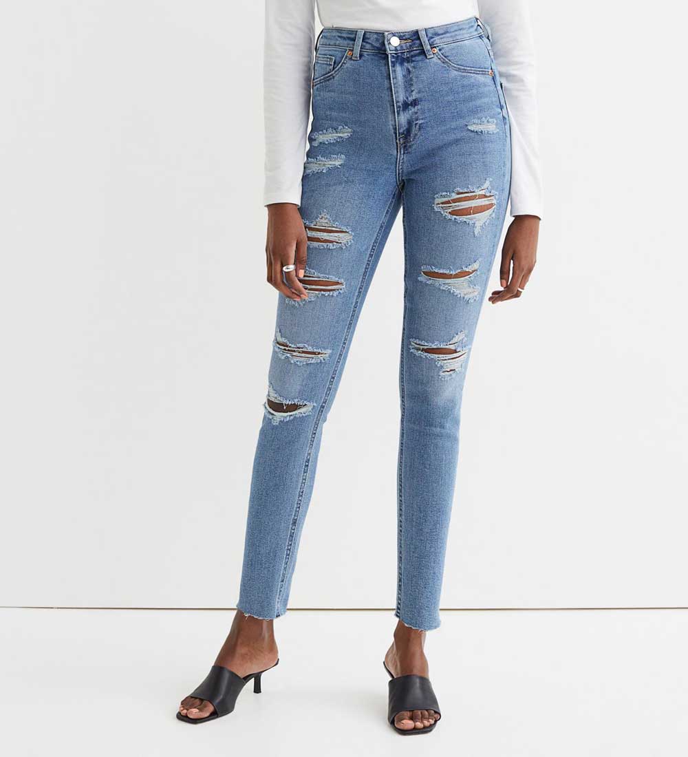 Jeans skinny strappati