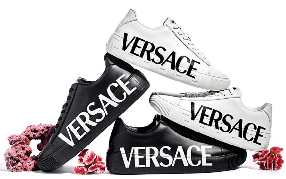Scarpe con logo Versace