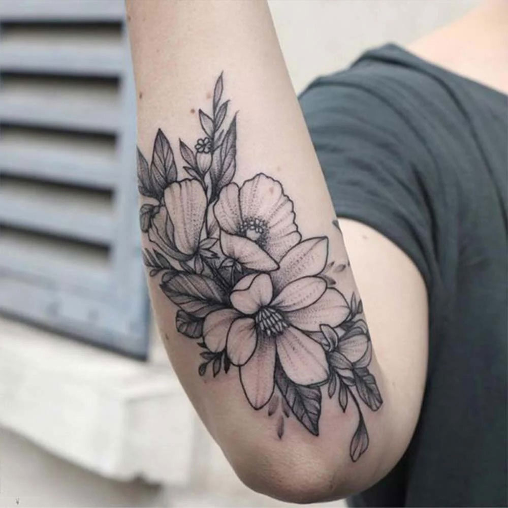 Tatuaggio fiori braccio