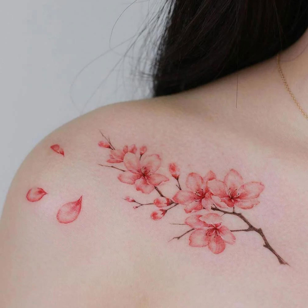 Tatuaggio fiori ciliegio