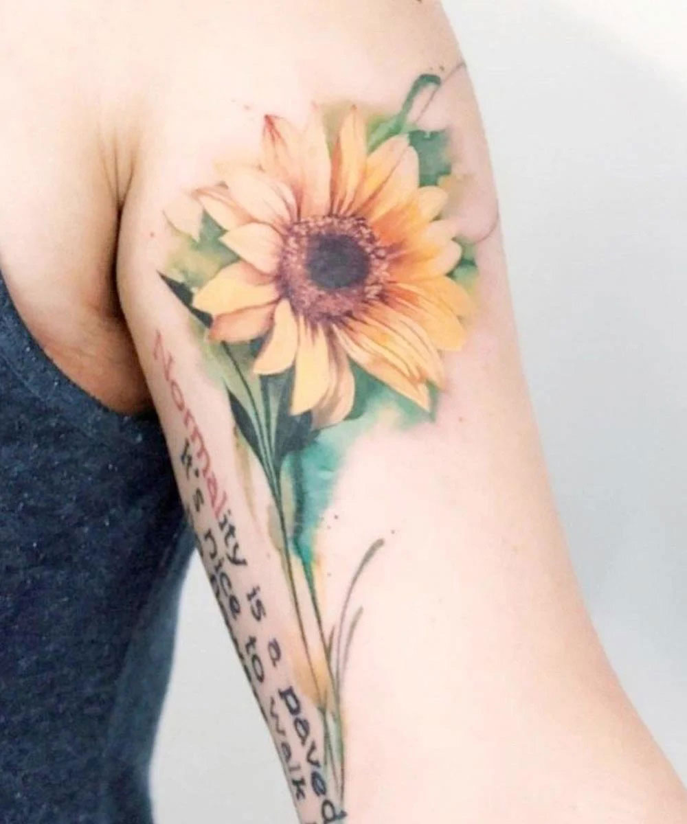 Tatuaggio scritte fiori