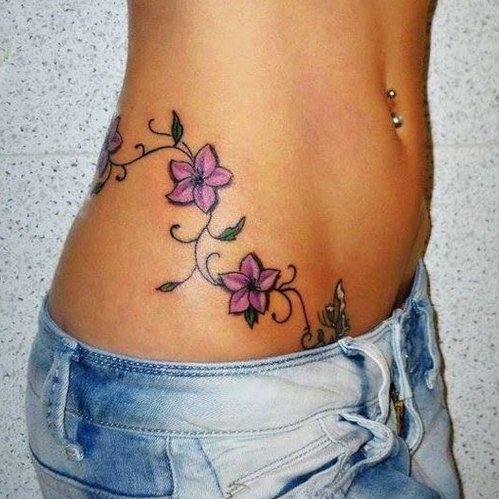 Tatuaggi fiori fianco e schiena