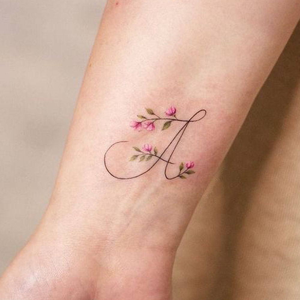 Tatuaggi fiori iniziale Tatuaggi fiori iniziale