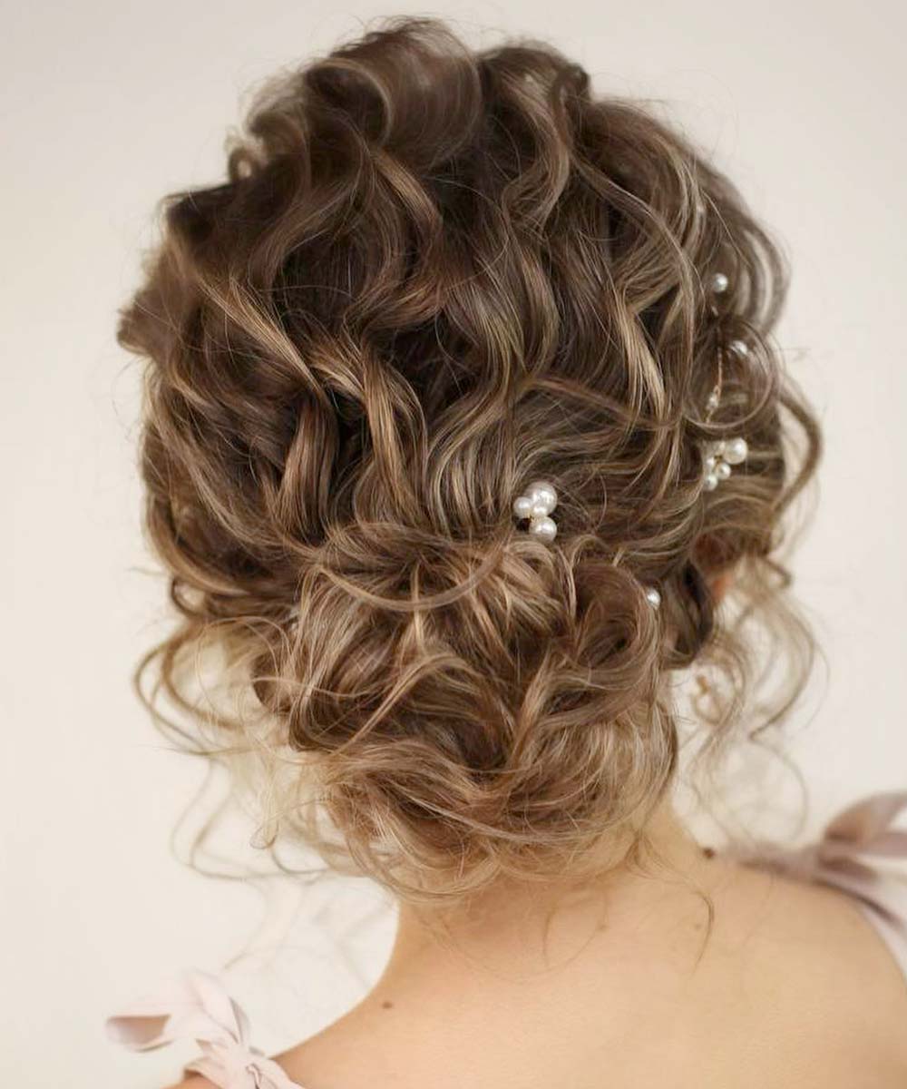 Acconciature raccolti matrimonio sposa capelli ricci Acconciature raccolti matrimonio sposa capelli ricci