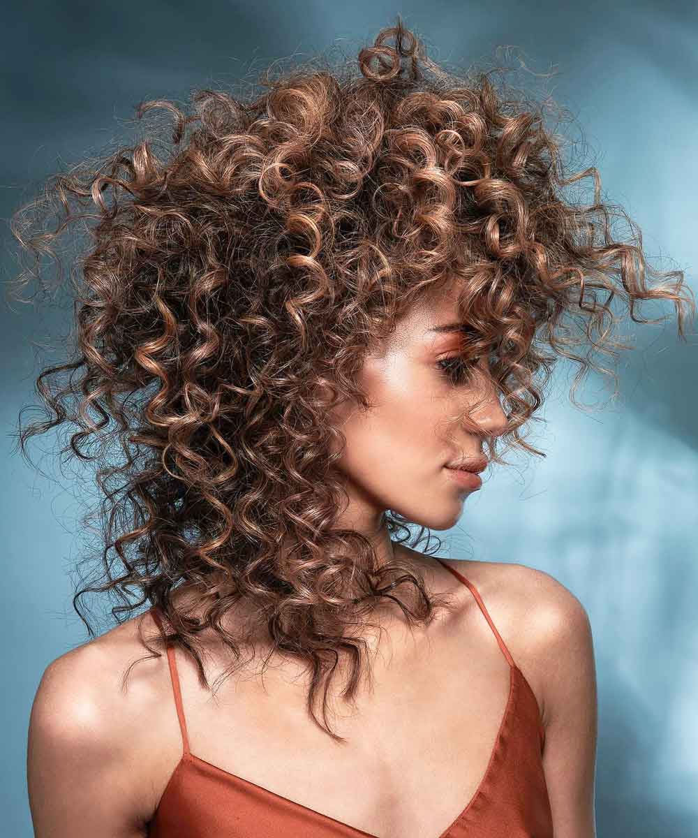 Tagli lunghi asimmetrici capelli ricci Tagli lunghi asimmetrici capelli ricci