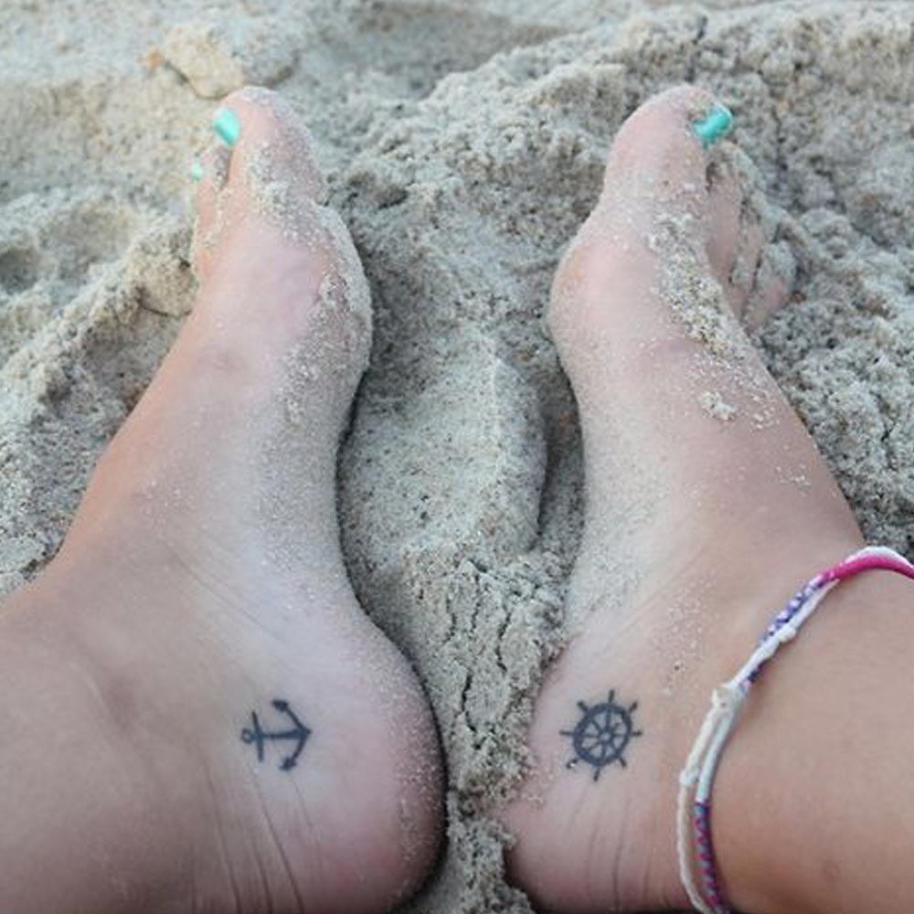 Tatuaggio ancora piede caviglia