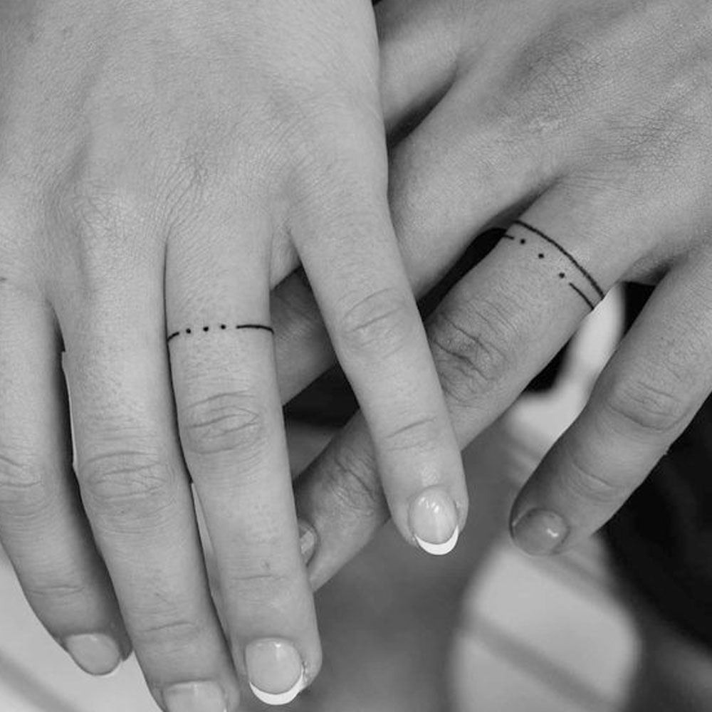Tatuaggi coppie dita