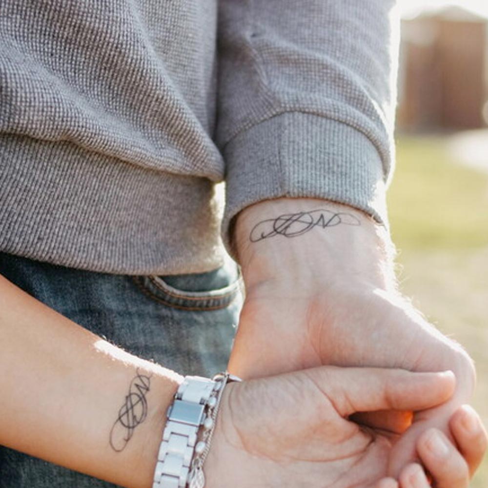 Tatuaggi coppia simbolo infinito 