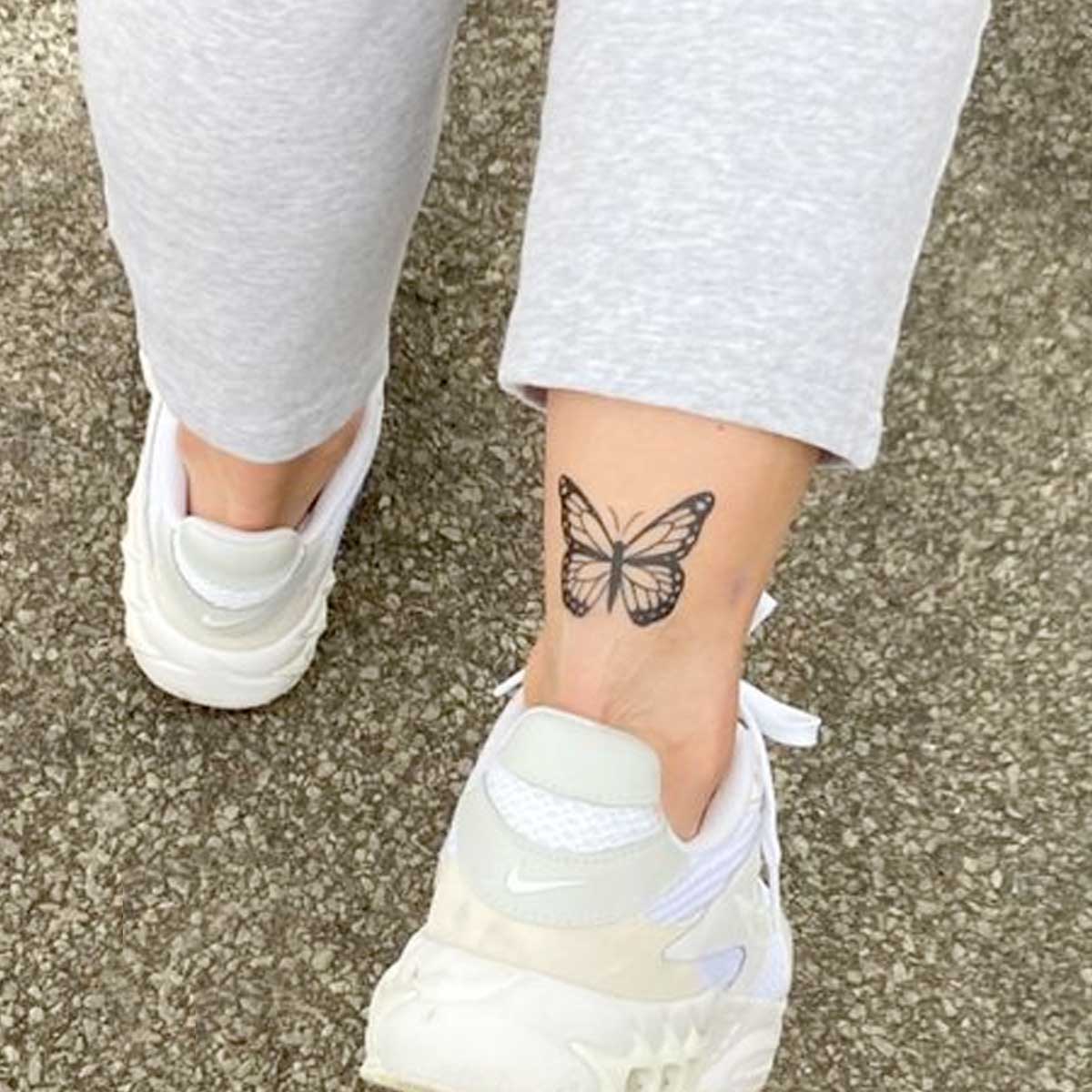 Tatuaggi farfalla caviglia e piede