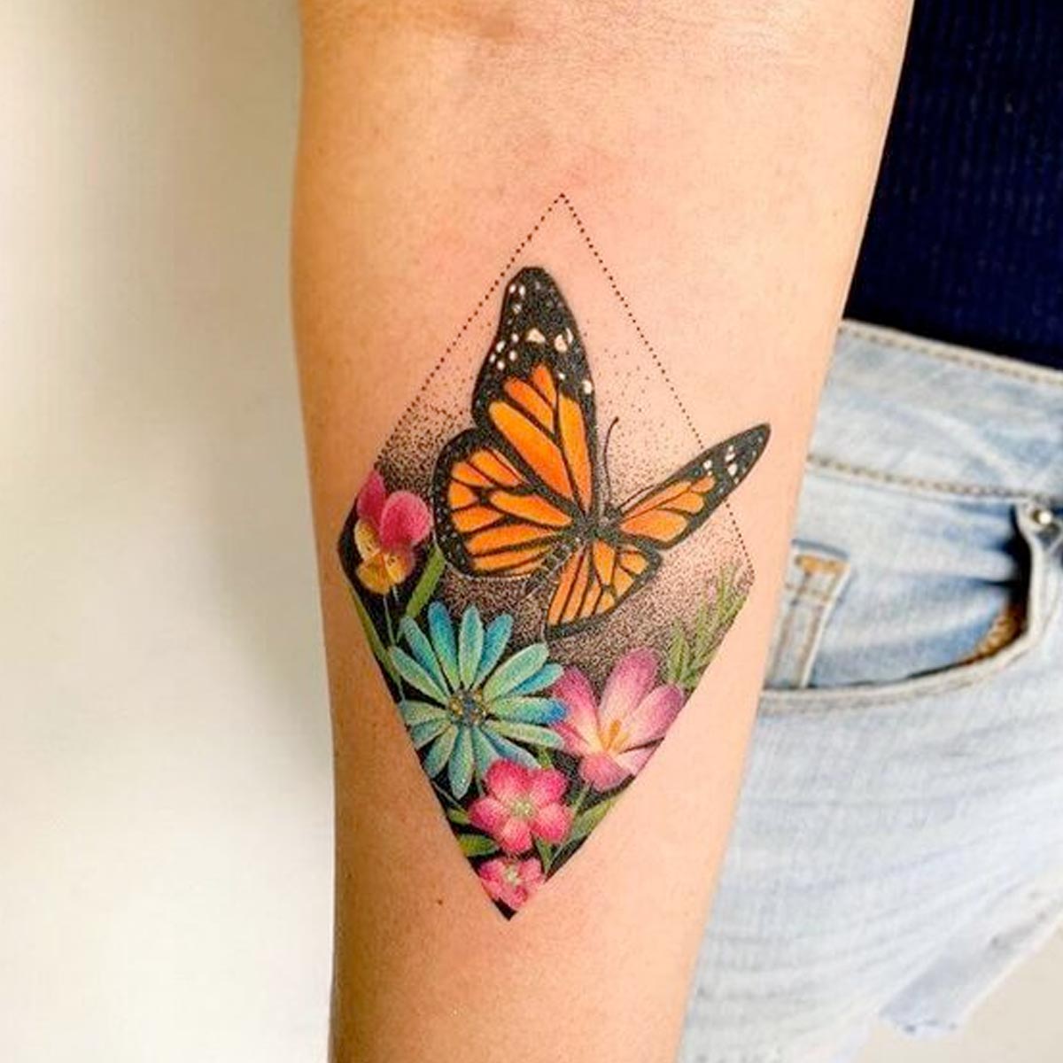 Tatuaggi farfalla e fiori