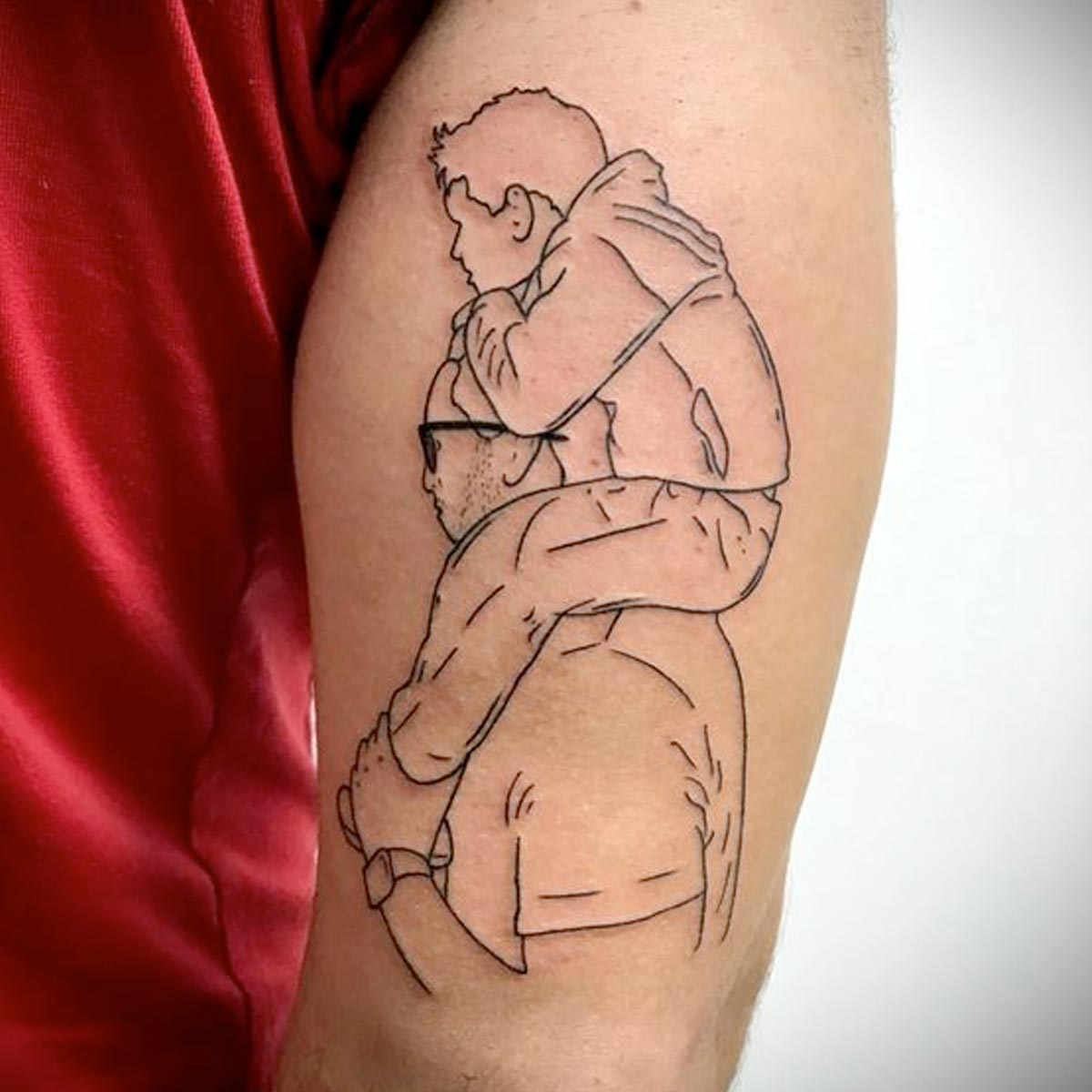 Tatuaggio con papà e figlio